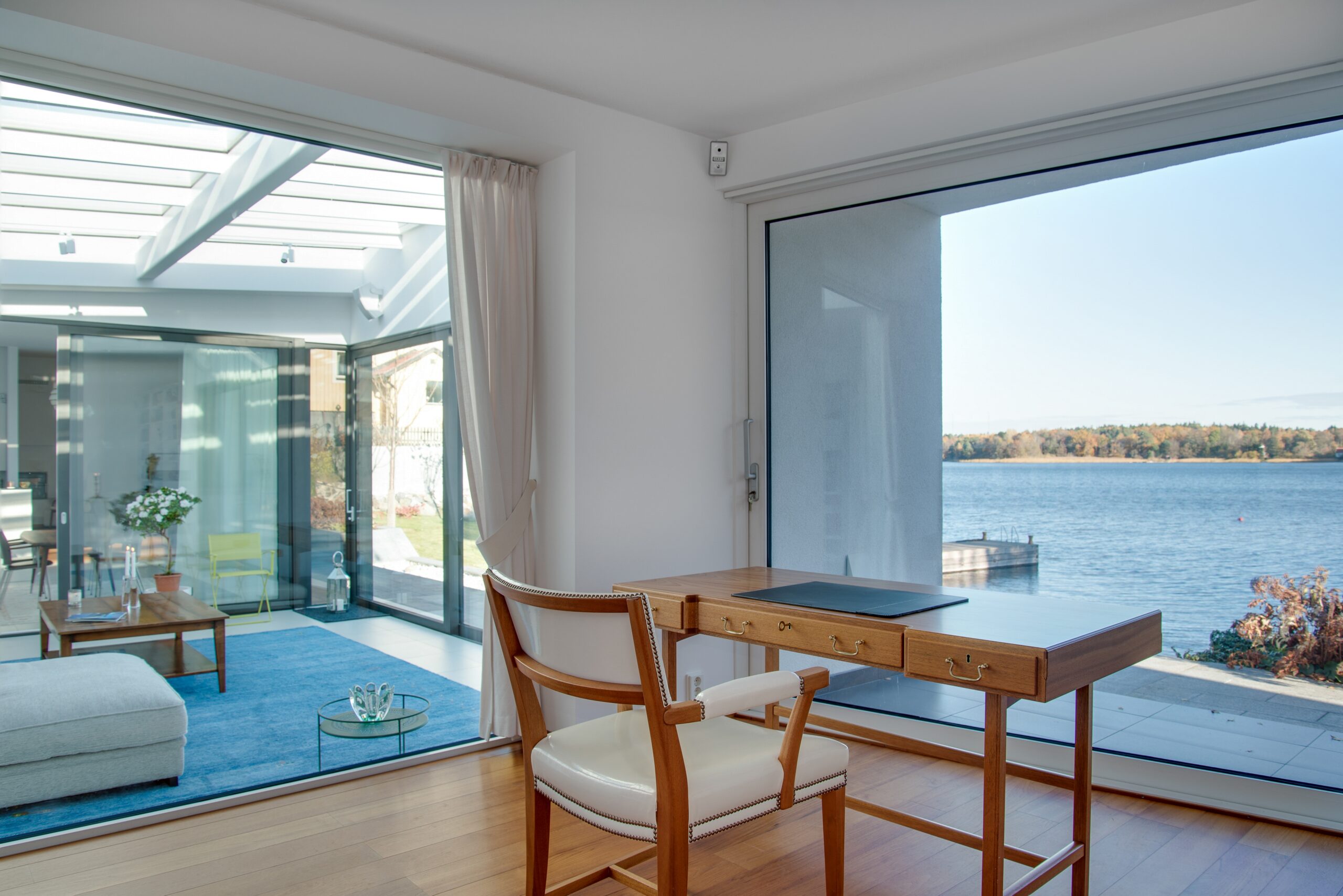 luxury-beach-house-with-glass-windows-beautiful-scenery-sea-scaled-1.jpg